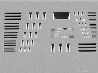 SEM-image of Stencil-mask with USAF-target resolution-pattern and 15° sidewall-tapering